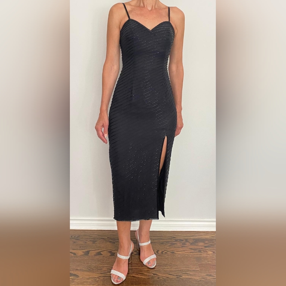 Beaded,black midi evening dress. Front slit, fully padded lining in chest.Size 6